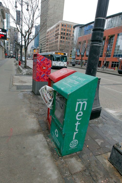 BORIS MINKEVICH / WINNIPEG FREE PRESS
Metro paper boxes on Portage Ave. in downtown winnipeg. Nov. 27, 2017