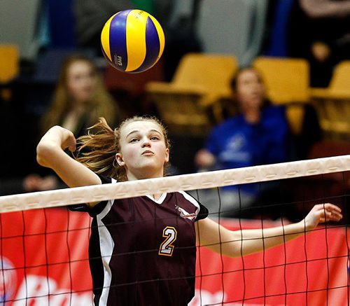 PHIL HOSSACK / WINNIPEG FREE PRESS  - Portage Collegiate Saint #2 Faith Buhler goes up eyes on the ball Wednesday evening in playoff action against the Selkirk Royals. See Mike McIntyre story. - November 28, 2017