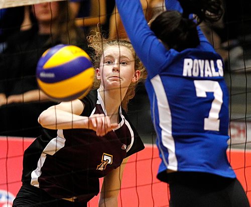 PHIL HOSSACK / WINNIPEG FREE PRESS  - Portage Collegiate Saint #7 Devon Borody slams the ball past Selkirk Royals' #7 Isabella Gierys Wednesday evening in playoff action. See Mike McIntyre story. - November 28, 2017