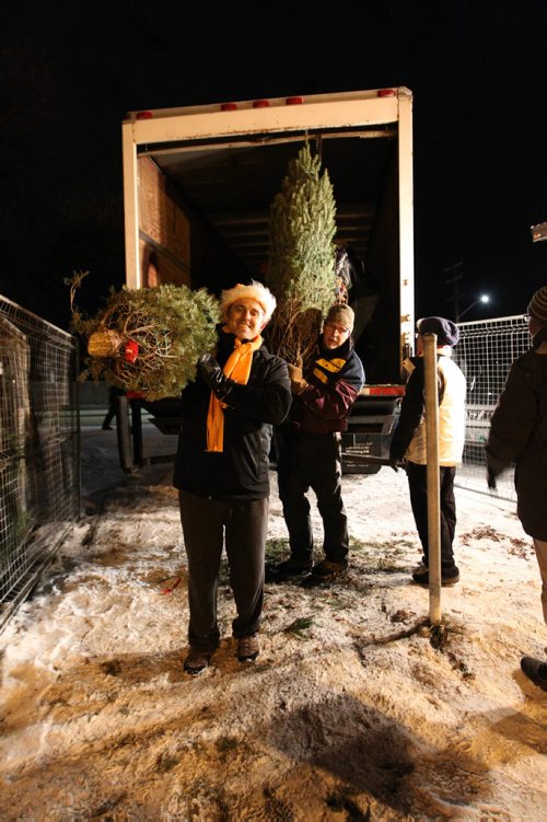 
First Kirkfield Scouting Group &   Wpg Optimists Athletics Running Club.  RUTH BONNEVILLE / WINNIPEG FREE PRESS

Volunteer Joe McKellep (front) and many others unload Christmas trees at Deer Lodge Golf Course for the St. James Optimist Club Thursday evening.  A portion of the funds raised from the sale of the trees go to First Kirkfield Scouting Group &  Wpg. Optimists Athletics Running Club which the volunteers are a part of.
Standup photo



Nov 30, 2017
