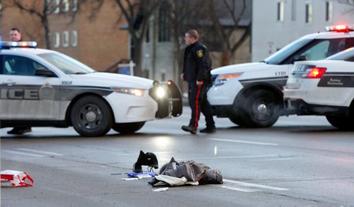 WAYNE GLOWACKI / WINNIPEG FREE PRESS

Winnipeg Police on the scene of a serious motor vehicle collision on Main St. at Anderson Ave. Friday morning. All lanes of southbound Main Street at Anderson were closed while police investigated.¤Dec.1 2017