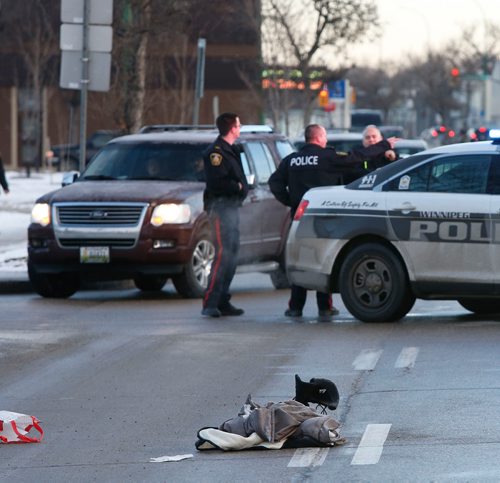 WAYNE GLOWACKI / WINNIPEG FREE PRESS

Winnipeg Police on the scene of a serious motor vehicle collision on Main St. at Anderson Ave. Friday morning. All lanes of southbound Main Street at Anderson were closed while police investigated.¤Dec.1 2017