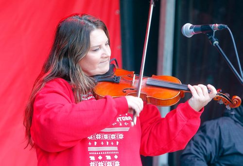 BORIS MINKEVICH / WINNIPEG FREE PRESS
The Rogers Hometown Hockey Tour at the Forks. Local fiddle player Patti Kusturok entertains from their stage on site. STANDUP PHOTO  Dec. 2, 2017