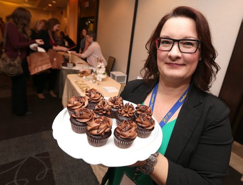 JASON HALSTEAD / WINNIPEG FREE PRESS

Renee Jordan of Something About Cake shows off her mini cupcakes at the Canadian Cancer Societys second annual Everything Chocolate Event on Nov. 17, 2017 at the Hilton Winnipeg Airport Suites. (See Social Page)