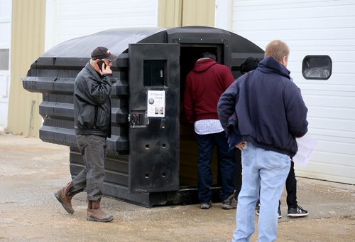 TREVOR HAGAN / WINNIPEG FREE PRESS
A pair of ice fishing shacks were getting a lot of attention at the Winnipeg Police unclaimed items auction at Associated Auto Auctions, Sunday, December 3, 2017.