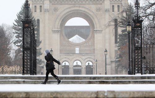 RUTH BONNEVILLE / WINNIPEG FREE PRESS

People cover themselves from the blowing snow as they walk down Tache in front of the Basilica  Monday morning.

Weather Standup photo 


Dec 04, 2017