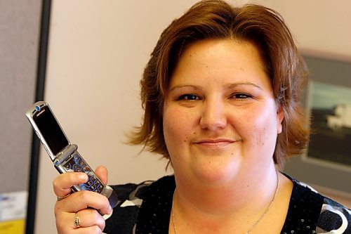 BORIS MINKEVICH / WINNIPEG FREE PRESS  081104 Shannon Eardley is not happy with her cell phone company.