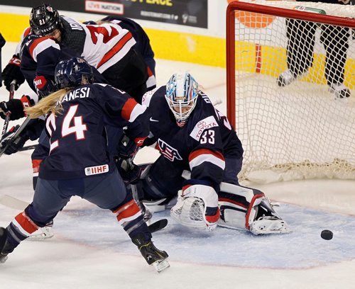 PHIL HOSSACK / WINNIPEG FREE PRESS  - USA netminder #33 Alex Rigsby looks for the loose puck in front of her net MTS Place Tuesday evening. See story.. -  December 5, 2017