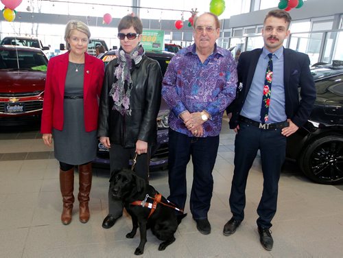 BORIS MINKEVICH / WINNIPEG FREE PRESS
Jim Gauthier Auto sponsors on seeing eye dog to the CNIB. Here is a photo of, from left, CNIB Major Gifts Manager Margot Ross, blind person Tracey Linklater with her working dog Missy, Jim Gauthier, and Kaylen Gauthier. Photo taken at the Jim Gauthier dealership at 1400 McPhillips. Canadian National Institute for the Blind says the dogs come from Australia and cost about $50,000 by the time they get working with a blind person. Dec. 7, 2017