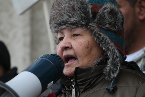 RUTH BONNEVILLE / WINNIPEG FREE PRESS

The Assembly of Manitoba Chiefs First Nations Family Advocate Office hold a rally in front of the Legislative Building to bring awareness to the over-representation of Indigenous children in Child and Family Services care Thursday afternoon.  
Spokesperson Catherine Richard speaks to group of people rallying at event on Legislature steps.  
 
Dec 0\7, 2017
