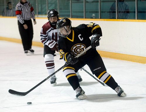 PHIL HOSSACK / WINNIPEG FREE PRESS  - Garden City Fighting Gopher #16 Alexis Herring works the puck around  Westwood #6 Carlie McHugh Thursday in WHSHL action. -  December 7, 2017