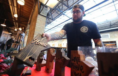 TREVOR HAGAN / WINNIPEG FRESS
Matthew Marakovits, owner of Huron Woodwork, in his booth at the Third and Bird Christmas Popup at The Forks, Sunday, December 10, 2017.