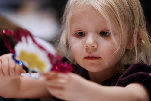 JOHN WOODS / WINNIPEG FREE PRESS
Ava Anton makes Christmas decorations at the WAG Holiday Party Sunday, August 27, 2017.