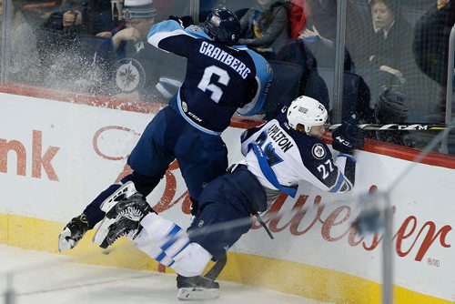 JOHN WOODS / WINNIPEG FREE PRESS
Manitoba Moose Mason Appleton (27) is checked by Milwaukee Admirals' Petter Granberg (6) during first period AHL action in Winnipeg on Sunday, December 10, 2017.