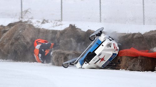 TREVOR HAGAN / WINNIPEG FREE PRESS
After being clocked at over 140km/h on his previous lap, Michel Pankratz (10) from Glidden, WI, hits the bails during the PM 340/SM 340SS 440 Final during CPTC racing in Beausejour, Sunday, December 10, 2017. He was ok.