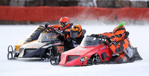 TREVOR HAGAN / WINNIPEG FREE PRESS
From left, Tyler Obie (21) from Beausejour, Greg Shepertycky (707) from Rocky Mountain House, AB, and Matt Szalai, from Garson, during the IFS 440x Final during CPTC racing in Beausejour, Sunday, December 10, 2017.