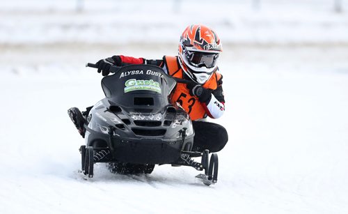 TREVOR HAGAN / WINNIPEG FREE PRESS
Alyssa Gusta, age 9, races in the Manitoba Mini Sled Racers Association on her 120cc snowmobile, during CPTC racing in Beausejour, Sunday, December 10, 2017. She has been racing since she was 4 years old.