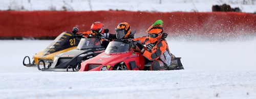 TREVOR HAGAN / WINNIPEG FREE PRESS
From left, Tyler Obie (21) from Beausejour, Greg Shepertycky (707) from Rocky Mountain House, AB, and Matt Szalai, from Garson, during the IFS 440x Final during CPTC racing in Beausejour, Sunday, December 10, 2017.