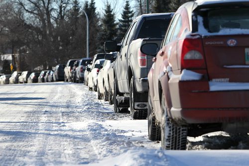 RUTH BONNEVILLE / WINNIPEG FREE PRESS

Photos of long line of cars parked along Lyndale Drive in Norwood Flats to go with story about area resident, Bob Gooding, collecting names of area residents  on a petition to rally city hall into changes parking regulations in their neighbourhood.   The daily grid lock causes problems and believes the drivers of these vehicles are mostly hospital staff wanting free parking.

See Rollason story. 

  

Dec 11, 2017