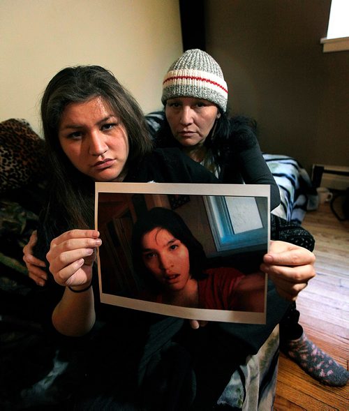 PHIL HOSSACK / WINNIPEG FREE PRESS  - Jessica Whitford holds a portrait of her sister Lydia (18) who died in foster care in July 2016. RCMP reported today they arrested the foster mother in connection with the death. Jessica and Lydia's mom Cecilia Sutherland sits behind Jessica. -  December 11, 2017