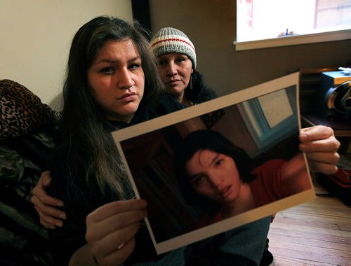 PHIL HOSSACK / WINNIPEG FREE PRESS  - Jessica Whitford holds a portrait of her sister Lydia (18) who died in foster care in July 2016. RCMP reported today they arrested the foster mother in connection with the death. Jessica and Lydia's mom Cecilia Sutherland sits behind Jessica. -  December 11, 2017
