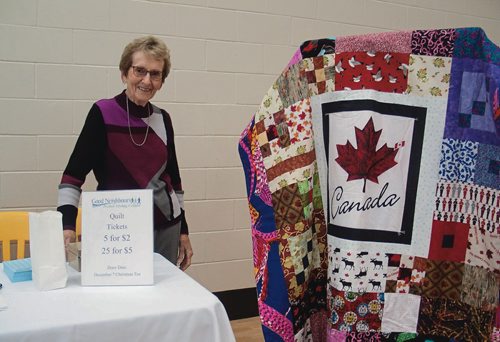 Canstar Community News Dec. 7, 2017 - Betty Hussey selling tickets for a quilt draw at the Good Neighbours' silver anniversary tea. (SHELDON BIRNIE/CANSTAR/THE HERALD)