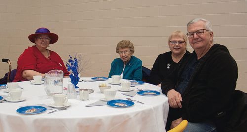 Canstar Community News Dec. 7, 2017 - (From left) Good Neighbours' members Aileen Feicho, Anne Faykes, and Jann and John Stuyck enjoyed the silver anniversary tea. (SHELDON BIRNIE/CANSTAR/THE HERALD)