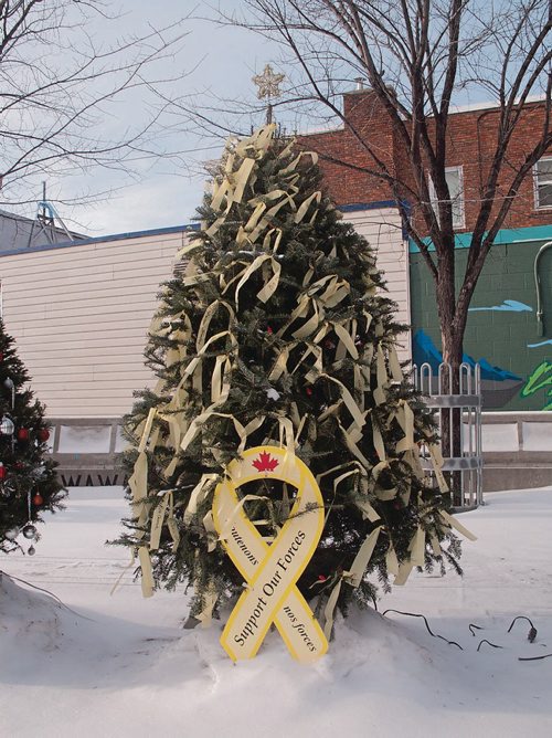Canstar Community News The Transcona Legion has decorated a tree in Transcona Centennial Square with yellow ribbons in support of Canadian troops overseas. (SHELDON BIRNIE/CANSTAR/THE HERALD)