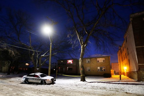 JOHN WOODS / WINNIPEG FREE PRESS
Police sit outside another officer involved shooting at 481 Charles Tuesday, December 12, 2017. The Independent Investigations Unit of Manitoba is involved in the case.