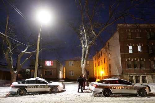 JOHN WOODS / WINNIPEG FREE PRESS
Police sit outside another officer involved shooting at 481 Charles Tuesday, December 12, 2017. The Independent Investigations Unit of Manitoba is involved in the case.