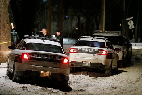 JOHN WOODS / WINNIPEG FREE PRESS
Police sit outside another officer involved shooting at 481 Charles Tuesday, December 12, 2017. The Independent Investigations Unit of Manitoba is involved in the case.