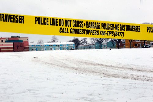 BORIS MINKEVICH / WINNIPEG FREE PRESS
A crime scene in the field near Charles and Flora. A jacket and what looks like blood in the middle of the field. Police tape surrounds the area and police and cadets guard the perimeter. Dec. 13, 2017