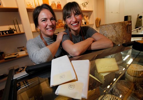 PHIL HOSSACK / WINNIPEG FREE PRESS  - INTERSECTION - Cheesemonger's Meg Gifford (left) and Courtney Dhaliwal owners of "Cheesemongers" on Corydon. Dave Sanderson story.   - Dec 13,2017