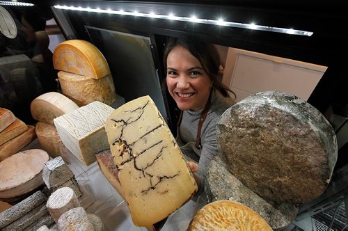 PHIL HOSSACK / WINNIPEG FREE PRESS  - INTERSECTION - Cheesemonger's Meg Gifford shows off product at her new shop on Corydon. Dave Sanderson story.   - Dec 13,2017