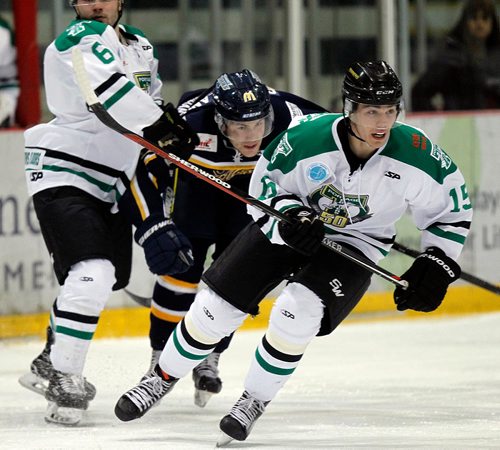 PHIL HOSSACK / WINNIPEG FREE PRESS  - Winnipeg Blues #23 is sandwiched between Portage Terriers #6 Lane Taylor and #15 Turner Ripplinger at the MJHL SHowcase winding up at the Ice Plex Wednesday evening. Jeff Hamilton story.  - Dec 13,2017