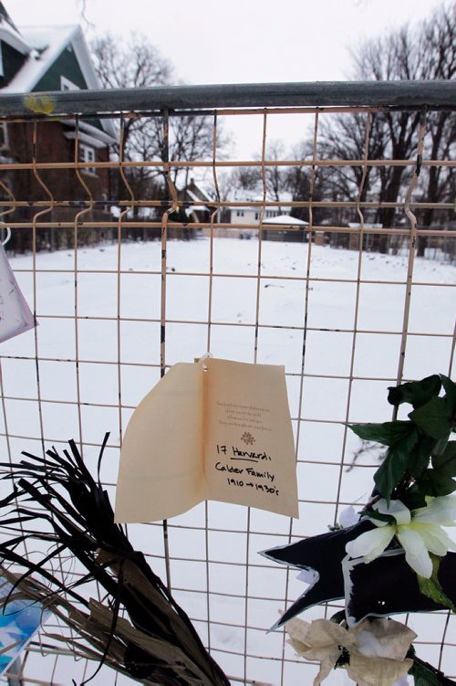 BORIS MINKEVICH / WINNIPEG FREE PRESS
17 Harvard - A memorial set up by upset residents after an old home on their street was demolished. Memorial has cards/flowers at the house. Dec. 15, 2017
