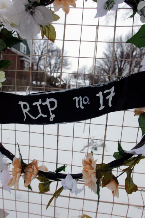 BORIS MINKEVICH / WINNIPEG FREE PRESS
17 Harvard - A memorial set up by upset residents after an old home on their street was demolished. Memorial has cards/flowers at the house. Dec. 15, 2017