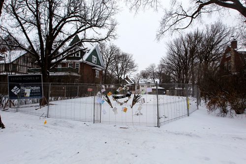 BORIS MINKEVICH / WINNIPEG FREE PRESS
17 Harvard - A memorial set up by upset residents after an old home on their street was demolished. Memorial has cards/flowers at the house. Dec. 15, 2017