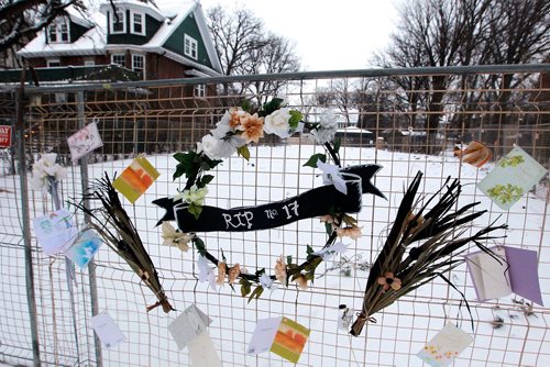 BORIS MINKEVICH / WINNIPEG FREE PRESS
17 Harvard - A memorial set up by upset residents after an old home on their street was demolished. Memorial has cards/flowers at the house. Dec. 15, 2017