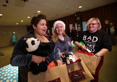 RUTH BONNEVILLE / WINNIPEG FREE PRESS

R.B. Russell School students express their excitement after receiving gifts to be given to their loved ones at Think Shift Make Nice Happen, event Friday.  
Think Shift delivered  presents to unprivileged youth so they can in turn give  the gifts to a special friend or family member that they normally would not have the ability to affod at special event Friday.  
 Names of students in photos:
Maria Elena Allen (dark hair), Mikayla Malanchuk (red hat) and Sydney Brosch (blond).  
 
Nadiah Sakurai | Intern

Dec 15, 2017
