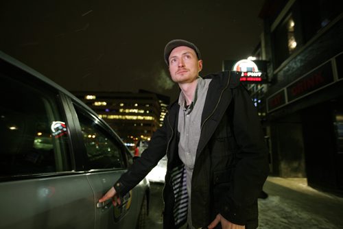 RUTH BONNEVILLE / WINNIPEG FREE PRESS

Winnipeg Free Press reporter Ryan Thorpe books a cab with a online app outside the Pint on Garry street Friday. 
For story on what the local cab service is like.  

See Ryan Thorpe story.   
(ride hailing, ride sharing, uber)
Dec 15, 2017
