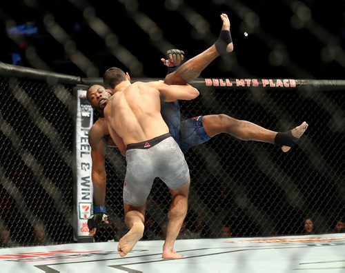 TREVOR HAGAN / WINNIPEG FREE PRESS
Alessio Di Chirico throws Oluwale Bamgbose during their middleweight at UFC on Fox 26 at Bell MTS Place, Saturday, December 16, 2017.