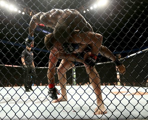 TREVOR HAGAN / WINNIPEG FREE PRESS 
Darren Stewart on top of Julian Marquez during their middleweight bout at UFC on Fox 26 at Bell MTS Place, Saturday, December 16, 2017. Marquez would go on to win.