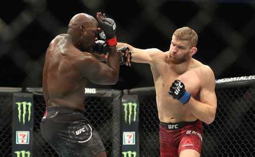 TREVOR HAGAN / WINNIPEG FREE PRESS 
Jan Blachowicz, right, punches Jared Cannonier during their light heavyweight bout at UFC on Fox 26 at Bell MTS Place, Saturday, December 16, 2017. Blachoqicz would win.