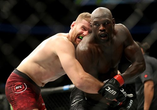 TREVOR HAGAN / WINNIPEG FREE PRESS 
Jan Blachowicz, left, grapples with Jared Cannonier during their light heavyweight bout at UFC on Fox 26 at Bell MTS Place, Saturday, December 16, 2017. Blachoqicz would win.