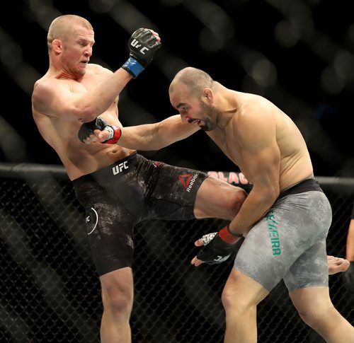 TREVOR HAGAN / WINNIPEG FREE PRESS
Glover Teixeira, right, and Misha Cirkunov during their light heavyweight bout at UFC on Fox 26 at Bell MTS Place, Saturday, December 16, 2017. Teixeira would win by TKO.