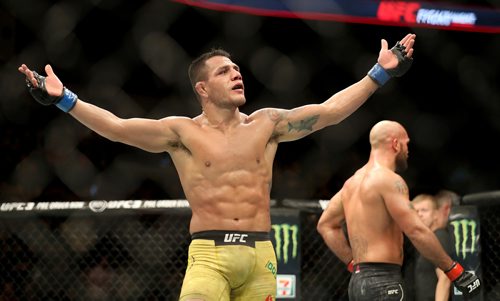 TREVOR HAGAN / WINNIPEG FREE PRESS
Rafael dos Anjos celebrates after the end of his welterweight against Robbie Lawler in the main event at UFC on Fox 26 at Bell MTS Place, Saturday, December 16, 2017.