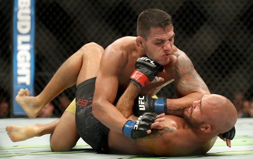 TREVOR HAGAN / WINNIPEG FREE PRESS
Rafael dos Anjos on top of Robbie Lawler during their welterweight bout which was the main event at UFC on Fox 26 at Bell MTS Place, Saturday, December 16, 2017.