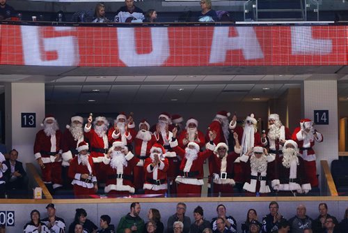 JOHN WOODS / WINNIPEG FREE PRESS
A box of Santas go crazy when Winnipeg Jets' Mark Scheifele (55) scored against the St. Louis Blues during third period NHL action in Winnipeg on Sunday, December 17, 2017.