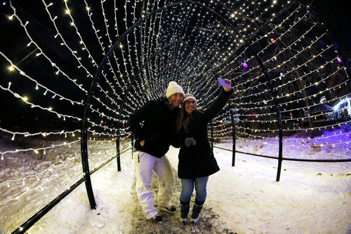 JOHN WOODS / WINNIPEG FREE PRESS
Tabitha Wall and Anastasia Schmidt were out enjoying the walking and skating trails at the Forks Sunday, December 17, 2017.
The new light installations include an archway of 12,500 lights through the Prairie Garden, between the Canopy Skating Rink and Oodena Celebration circle. The on-land skating and walking trails will also be lit.